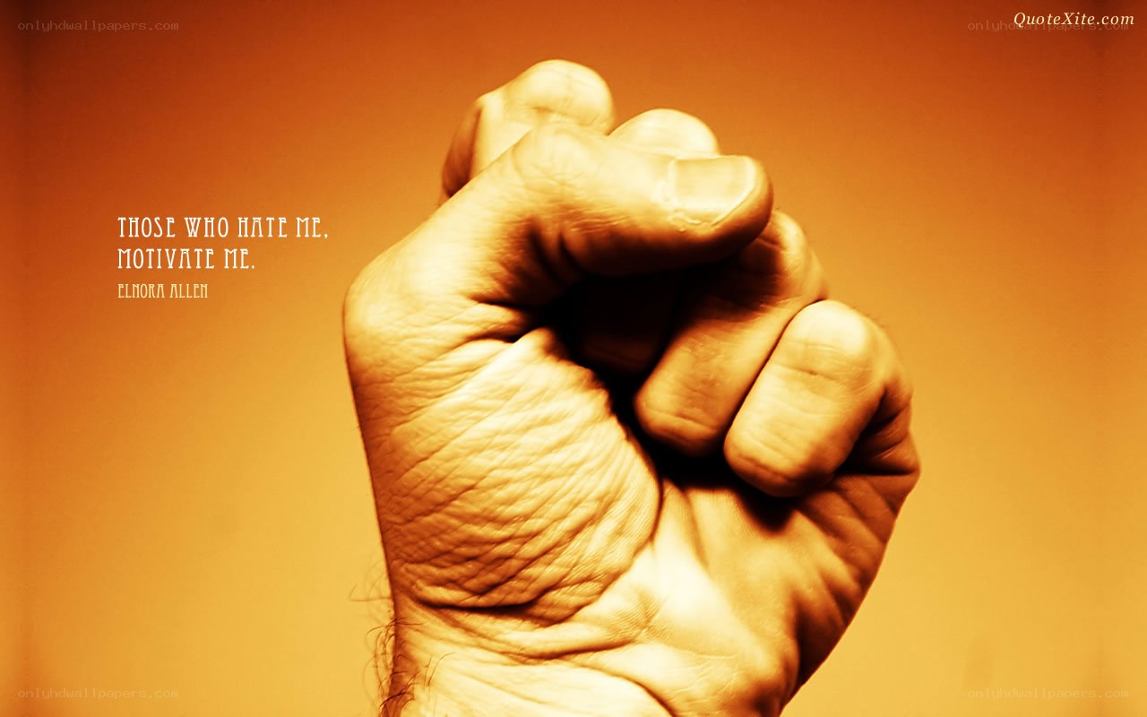 fist with motivational quote
