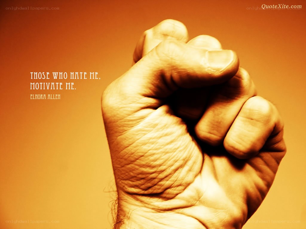 fist with motivational quote