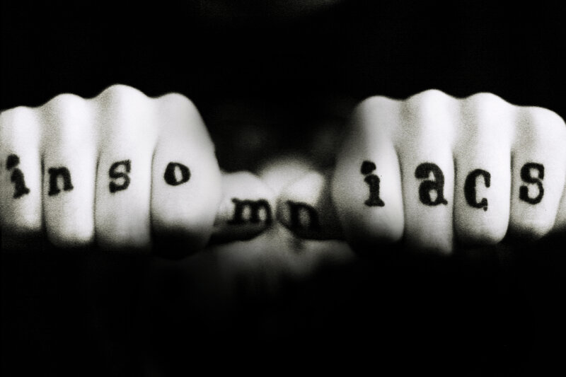 fists spelling insomniacs