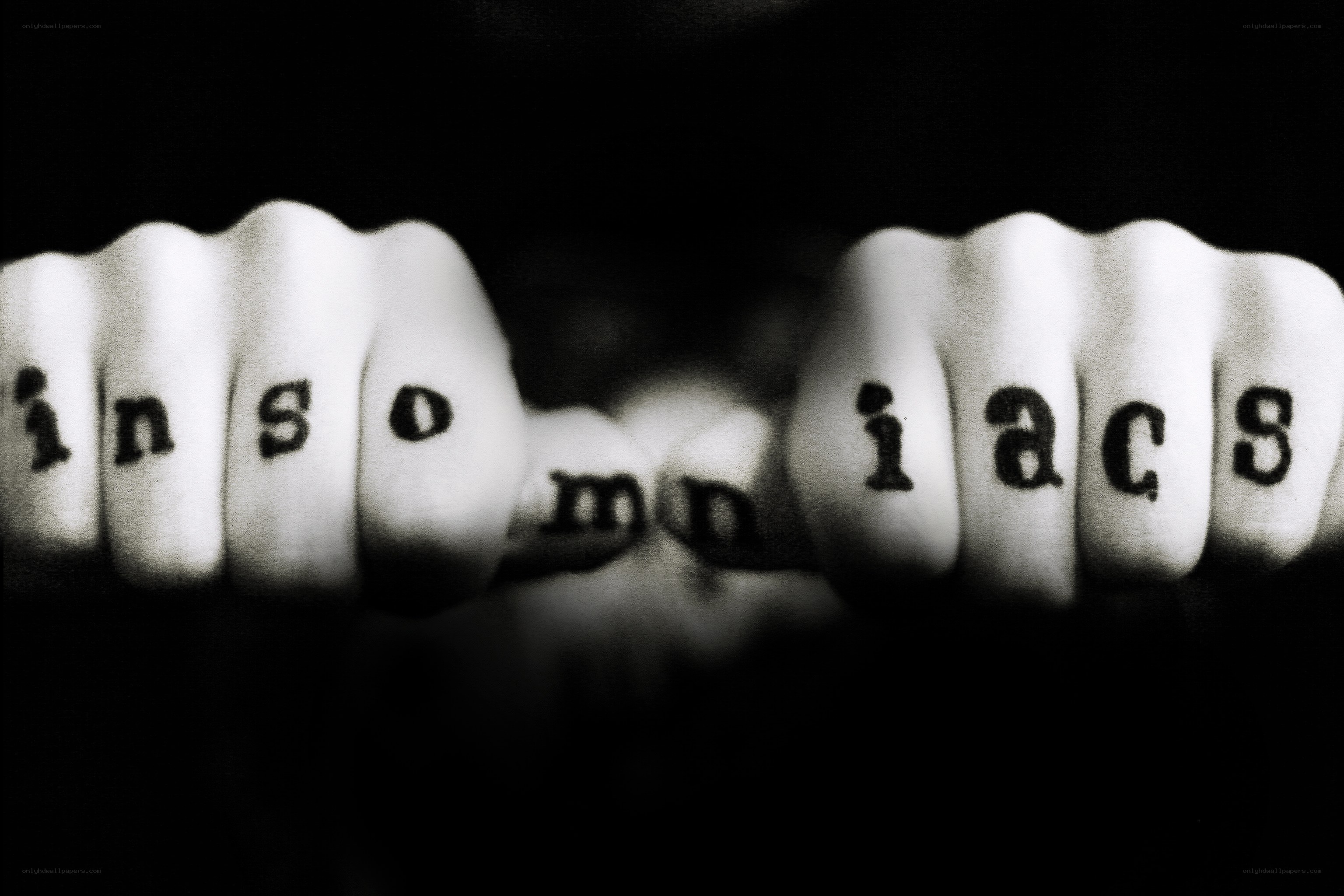 fists spelling insomniacs