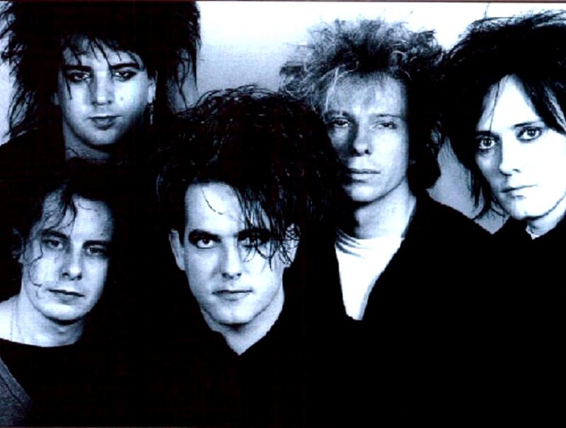 Five Band Members — Black, Serious
