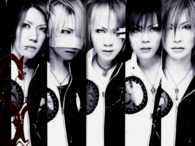 Five Band Members in Black and White