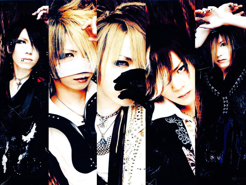 Five Band Members in Dark Clothing — Black