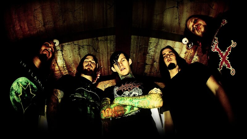 Five Band Members in Dark Room