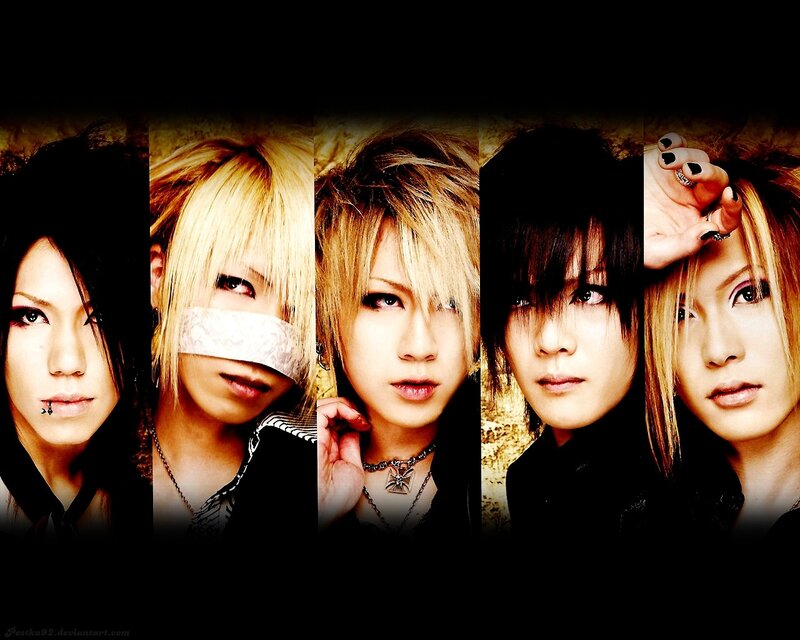 five band members in goth style