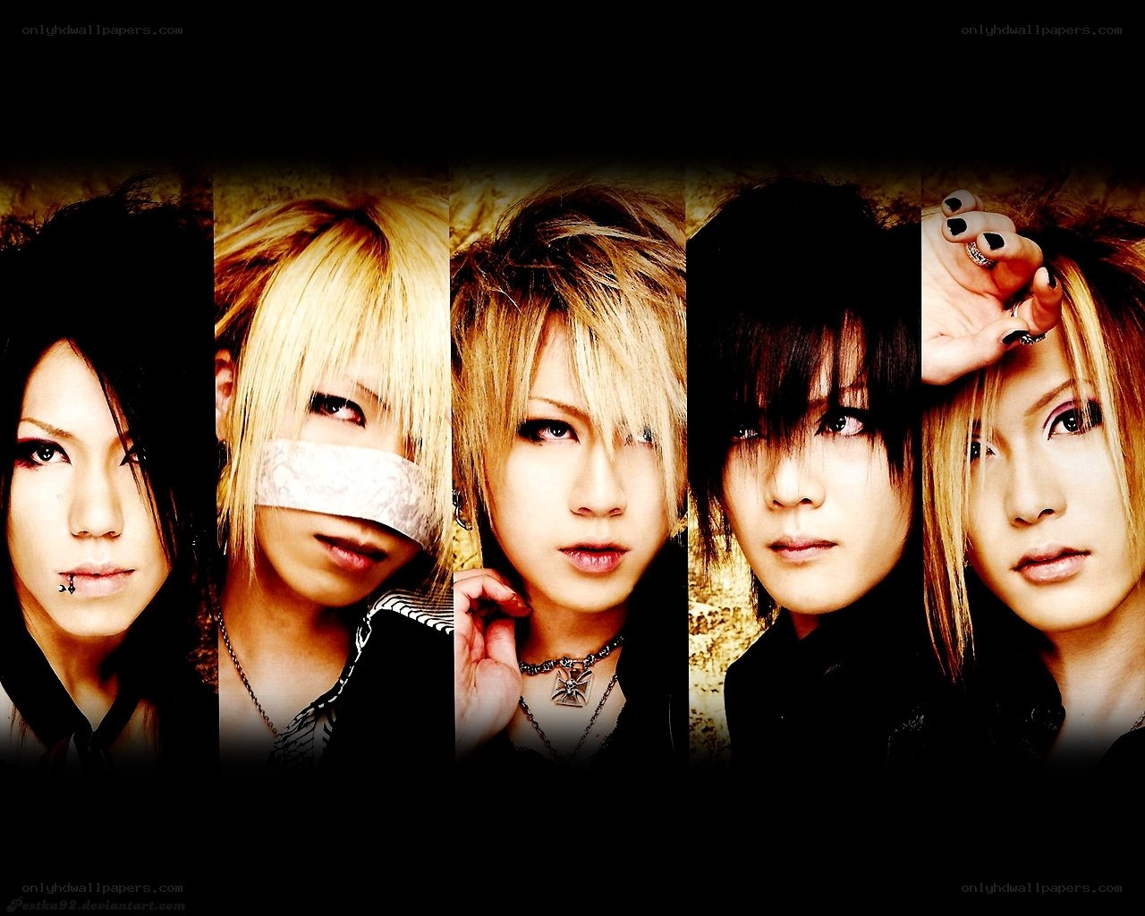 five band members in goth style