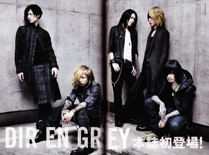 Five Band Members Posing — Black, Dark