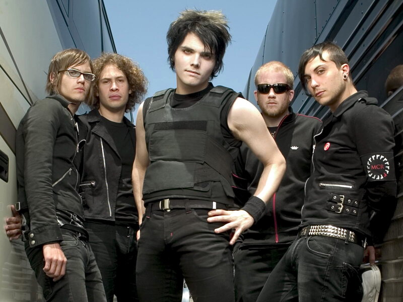 Five Band Members Posing — Black, Serious, Afternoon