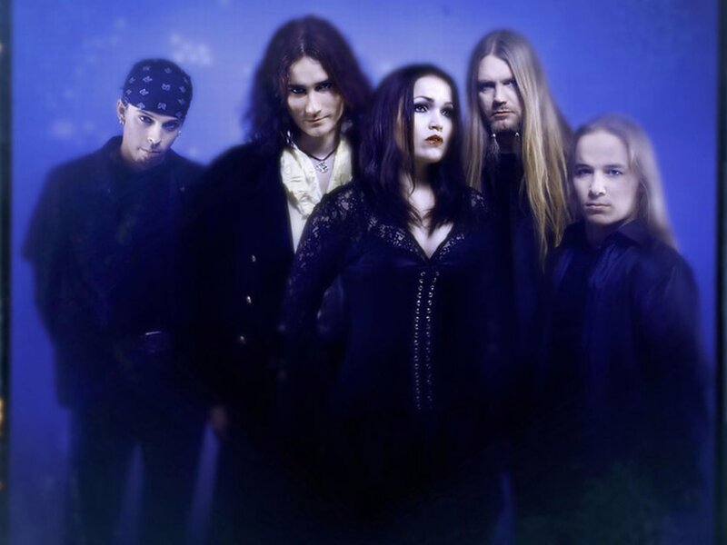 Five Band Members Posing — Blue