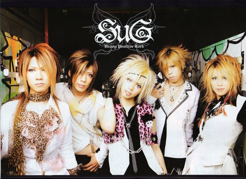 Five Band Members Posing — White