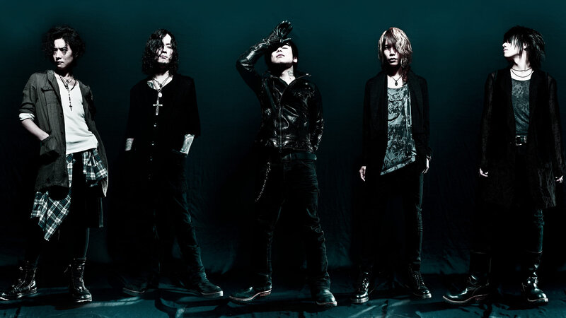 Five Band Members Standing — Black, Dramatic