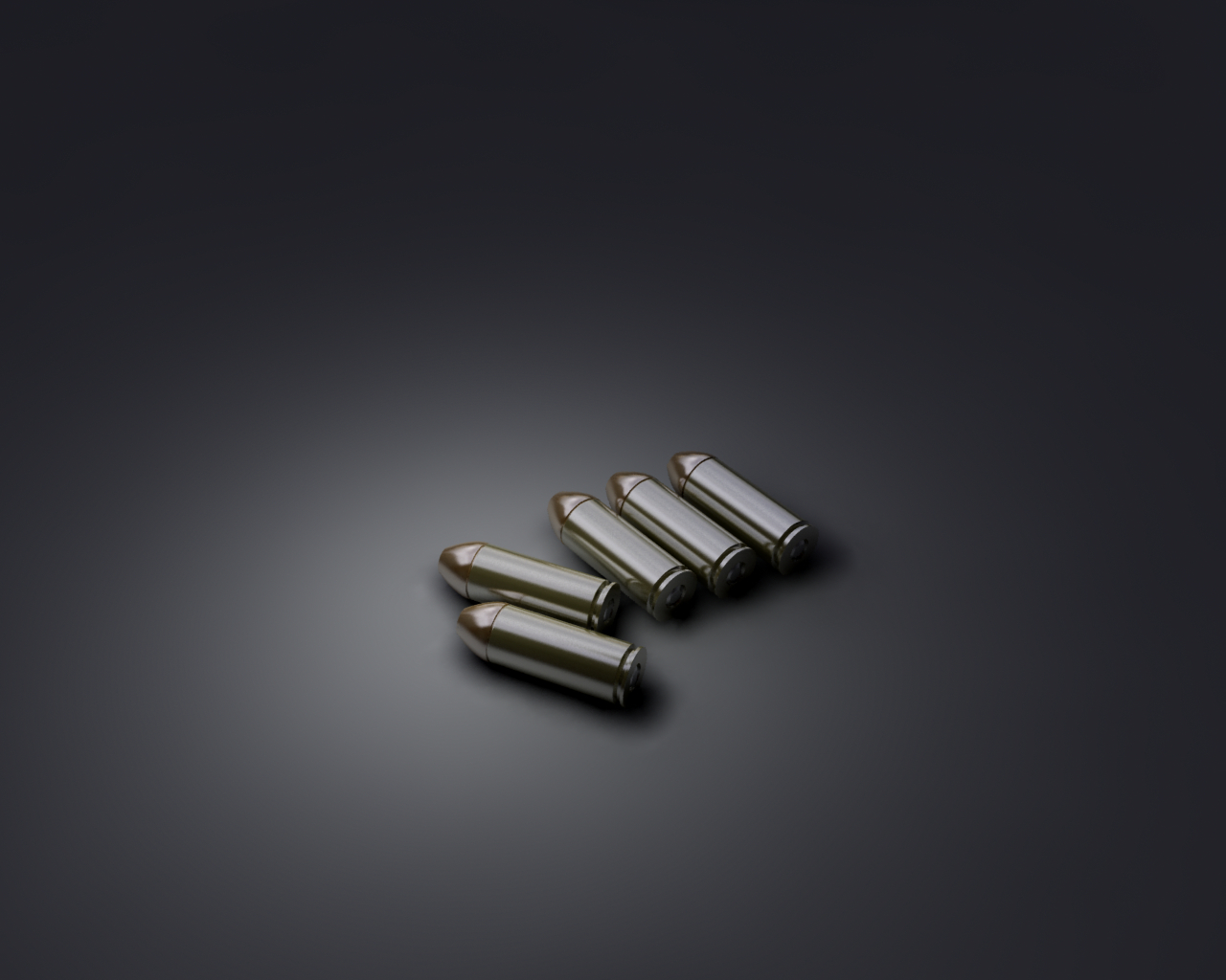 Five bullets on dark surface
