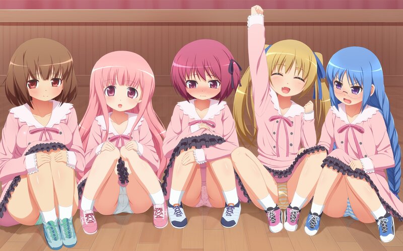 five girls in pink uniforms