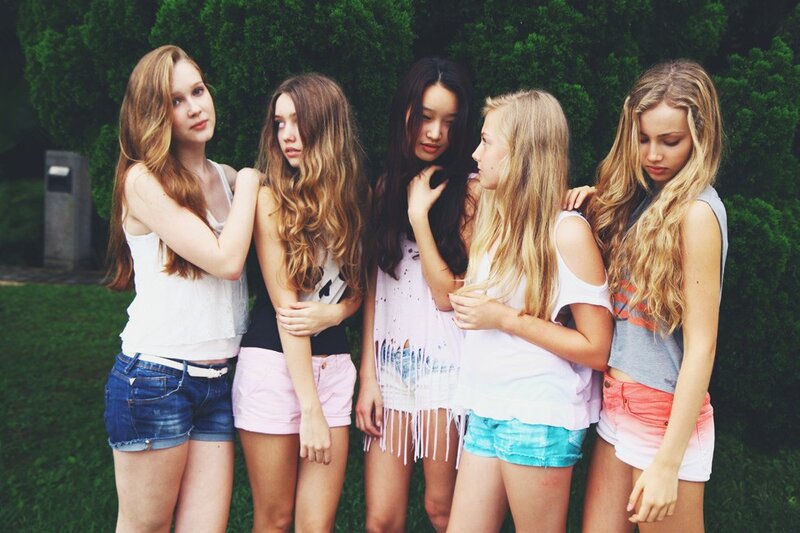 five girls standing together
