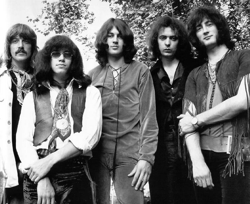 Five Men in 1970s Attire