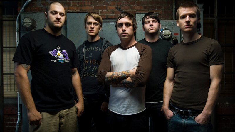 Five Men in a Band — Black, Serious, Photograph, Brick Wall