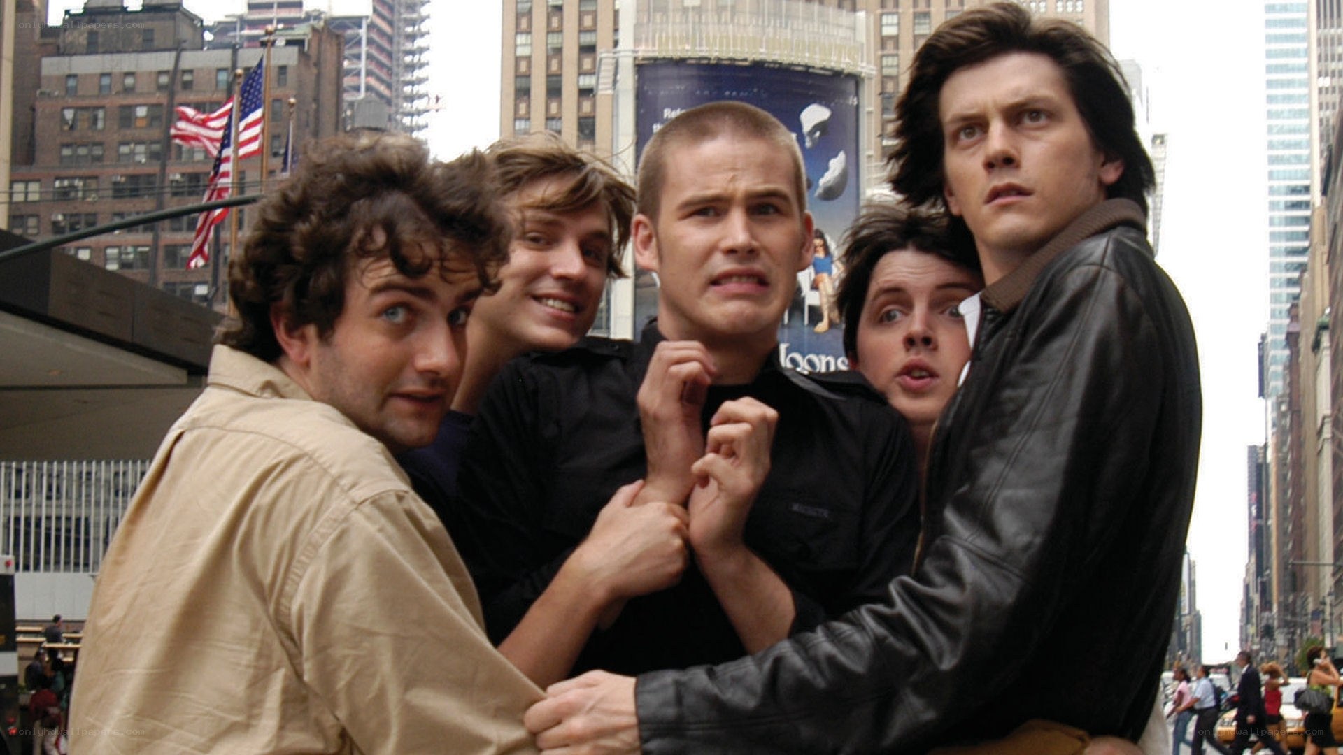 Five men in a city street
