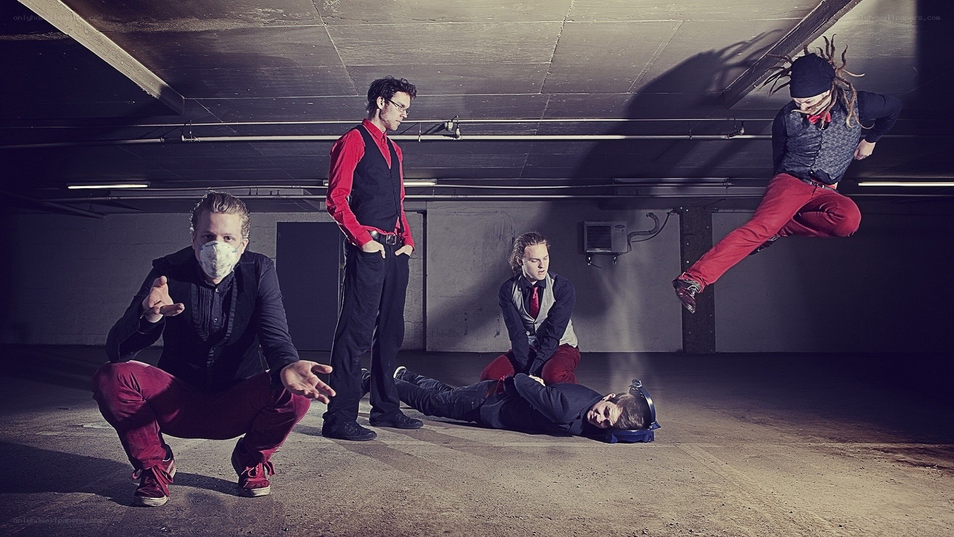 Five men in a parking garage