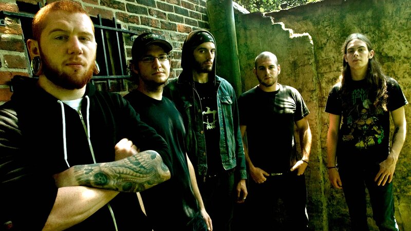 Five Men in Band Attire — Black, Serious, Afternoon, Photograph, Brick Wall