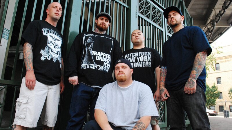 Five Men in Band T-shirts — Black, Serious