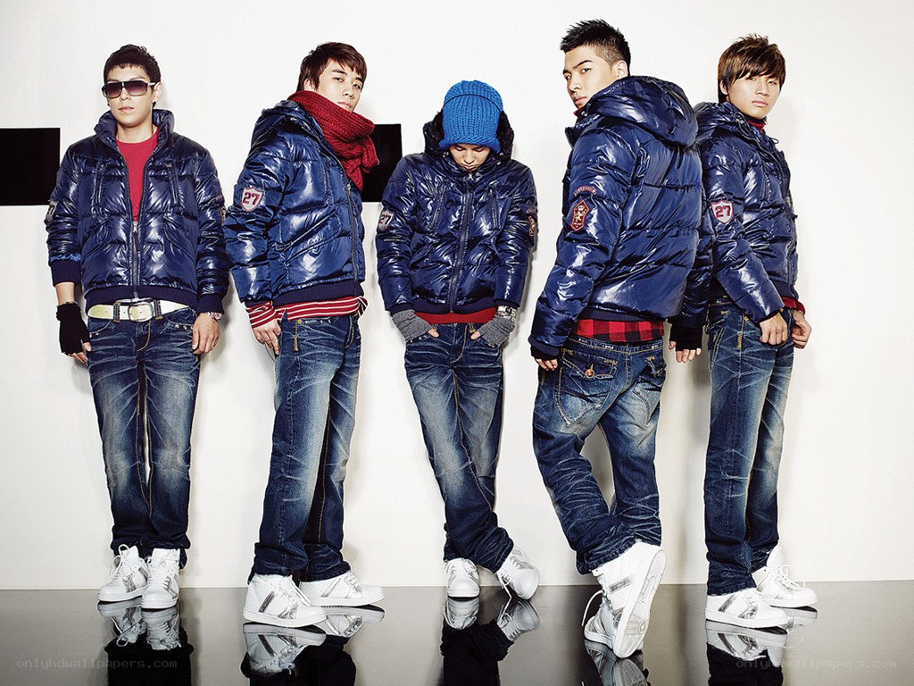 five men in blue puffer jackets