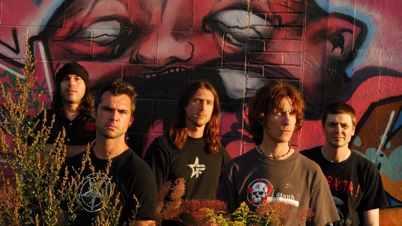 Five Men in Front of Graffiti