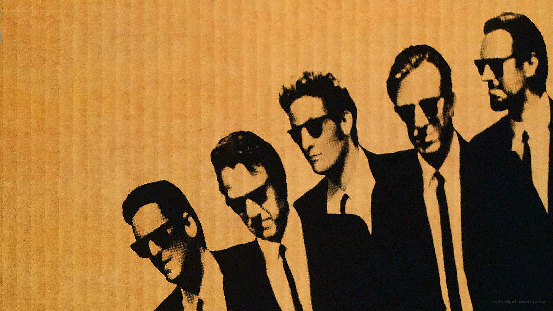 five men in suits and sunglasses