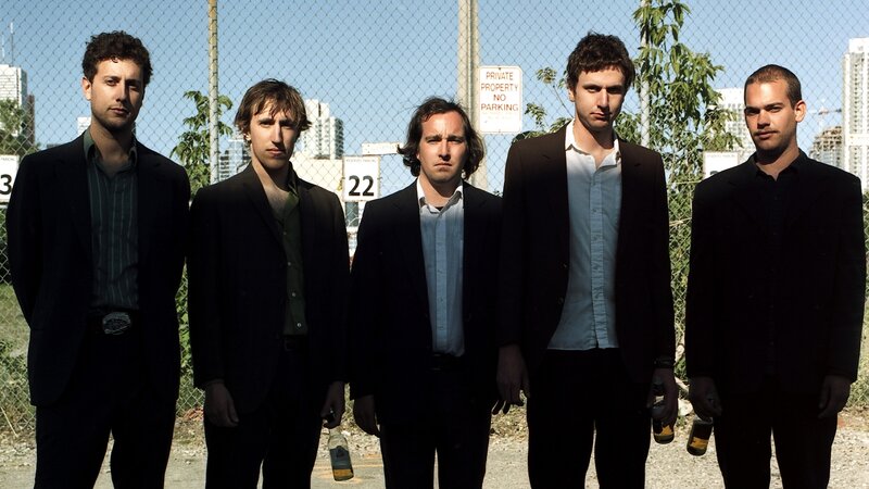 Five Men in Suits — Black, Serious, Afternoon