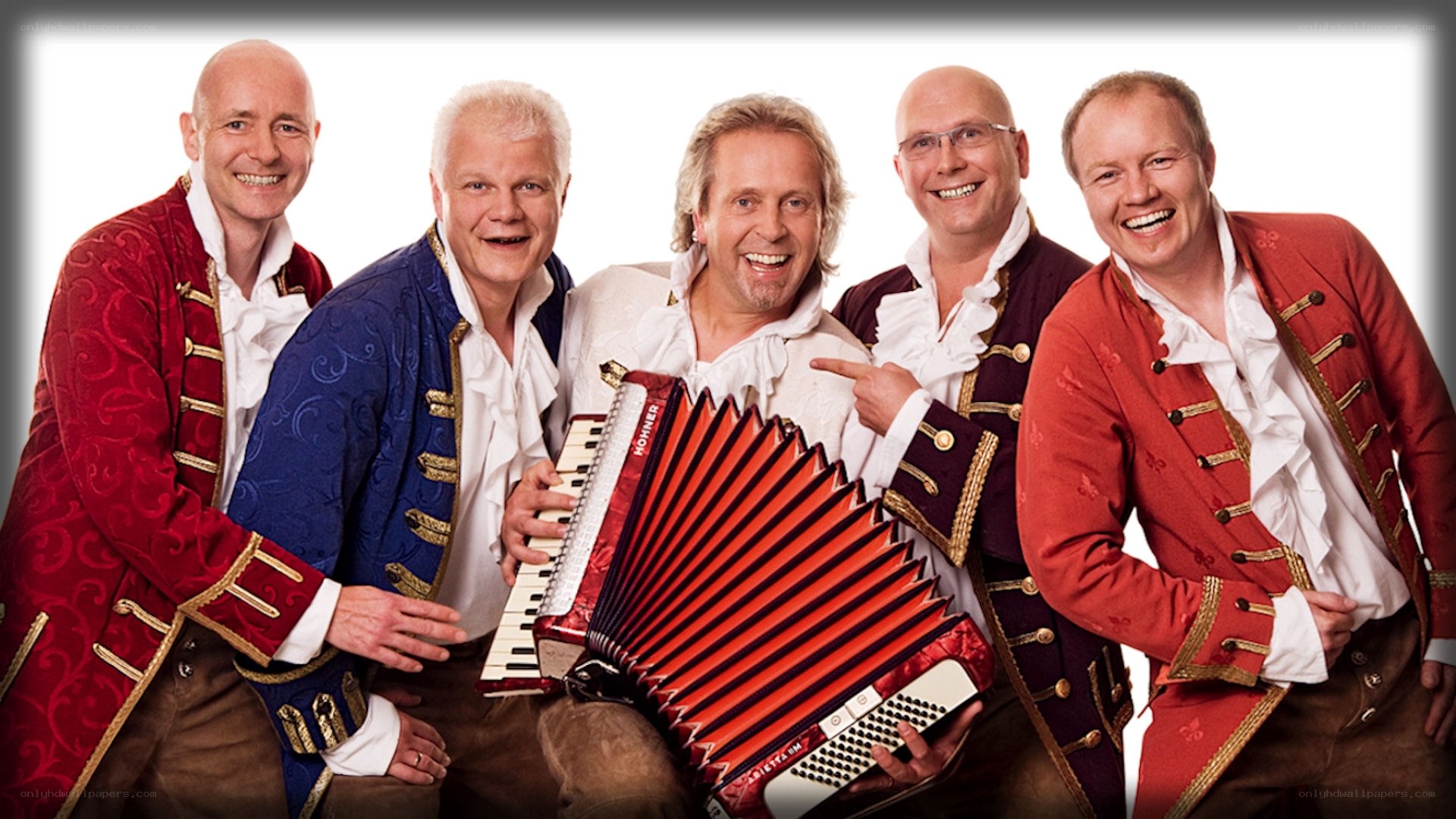 five men in traditional costumes