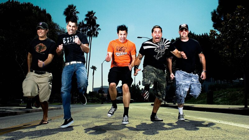 five men running on street