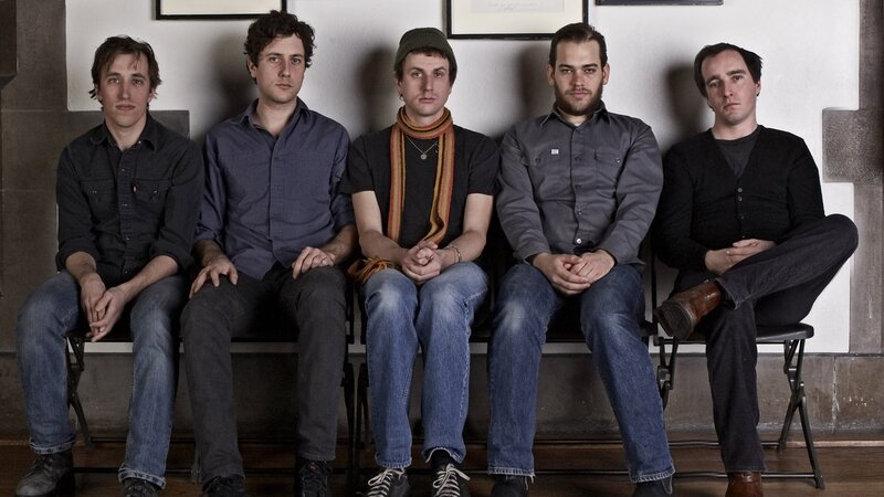 Five Men Sitting on Bench