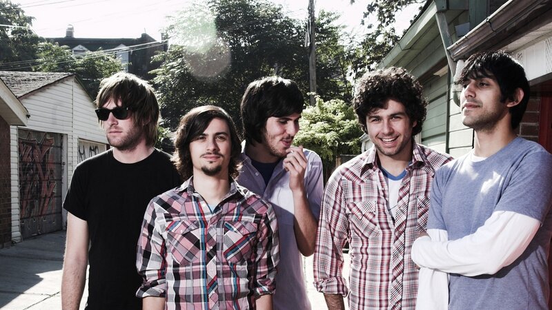 five men standing together