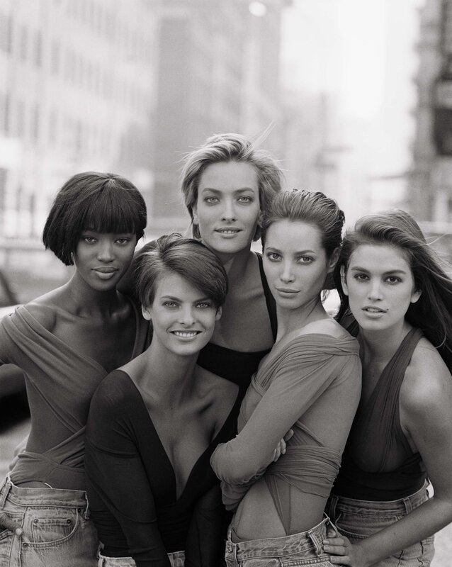 Five models in a group portrait