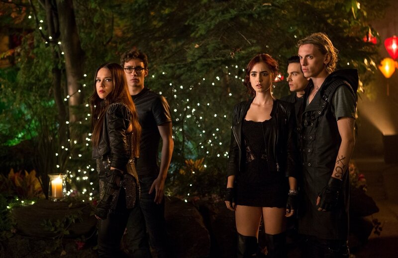Five People in Dark Clothing — Black, Dramatic