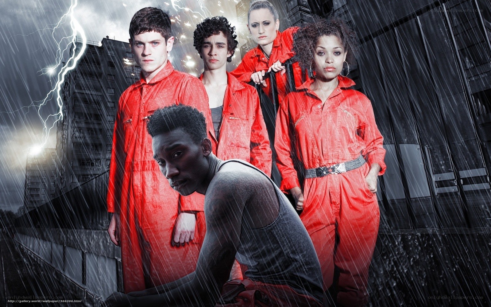 Five people in red jumpsuits in storm