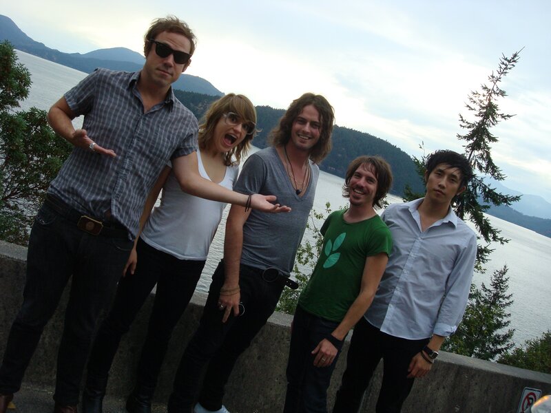 Five People Posing — Green