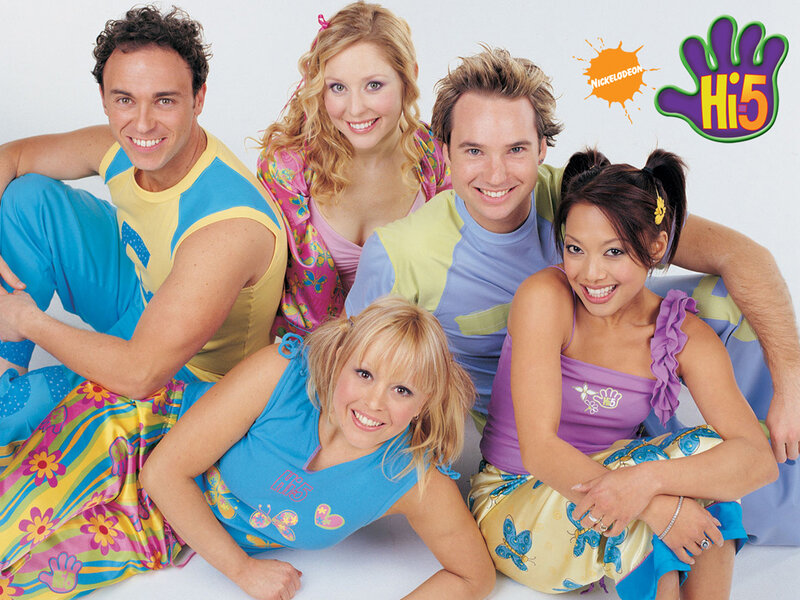 Five People Posing Together — Blue