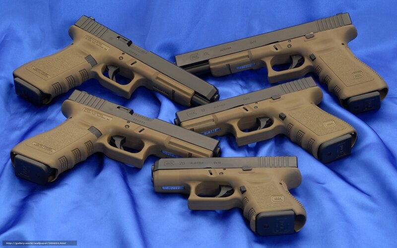Five Tan Handguns
