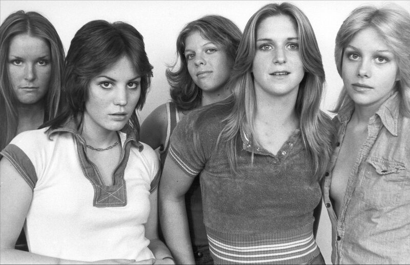 five women in a group portrait