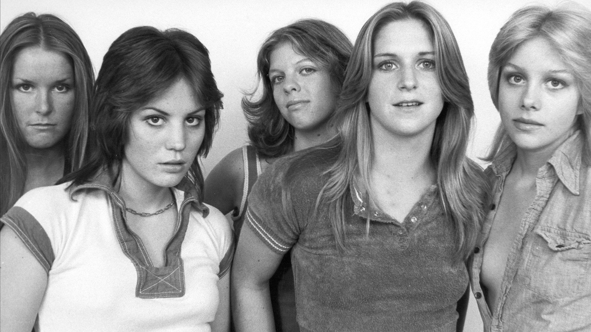 five women in a group portrait