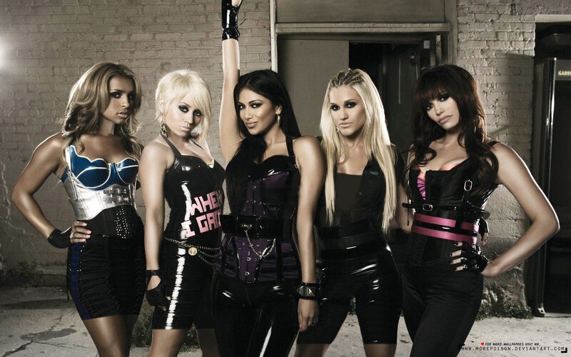five women in black outfits