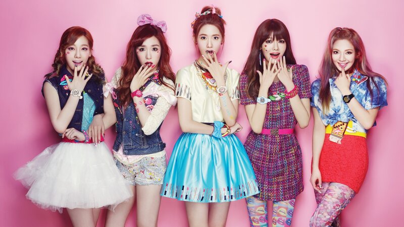 five women in colorful outfits