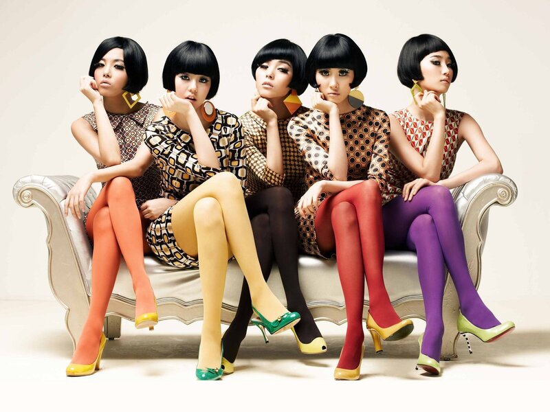 Five women in colorful tights