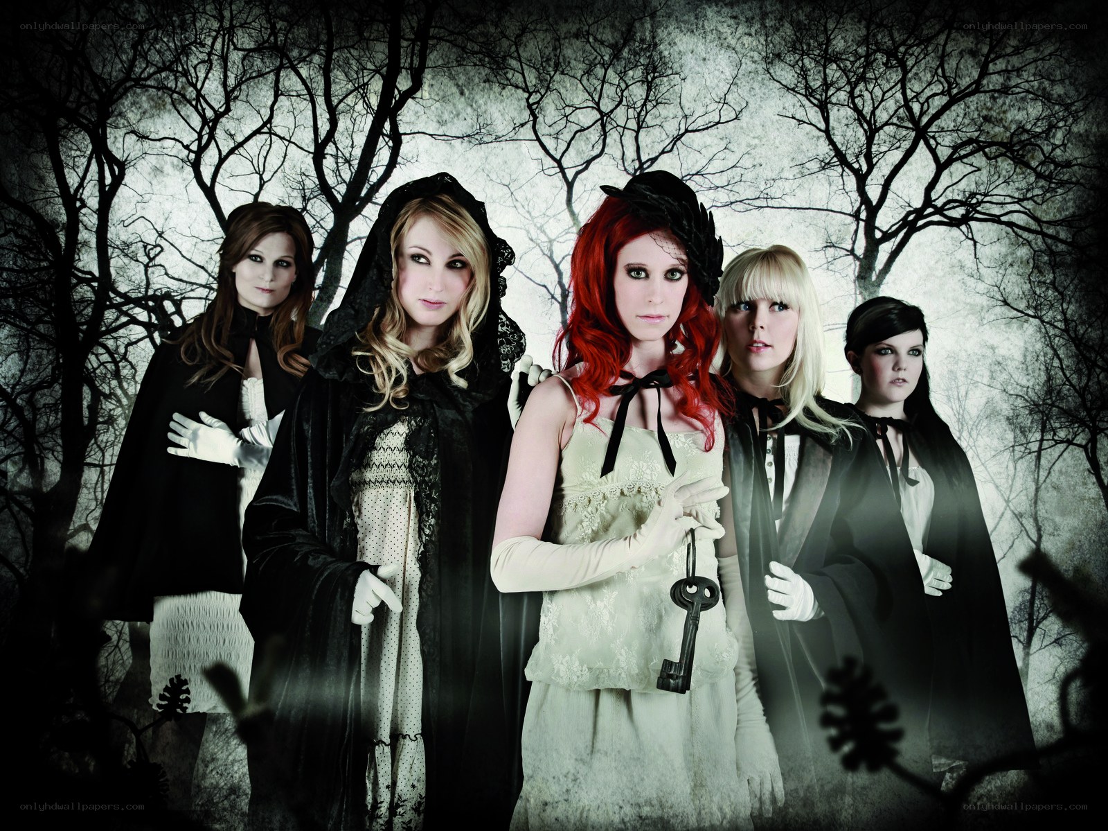 five women in gothic attire