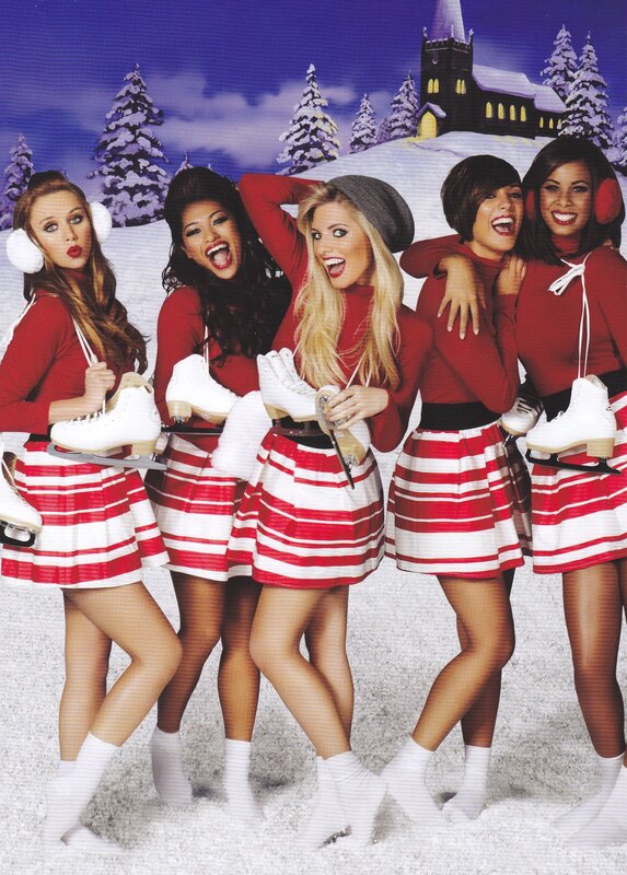 Five women in holiday skating outfits