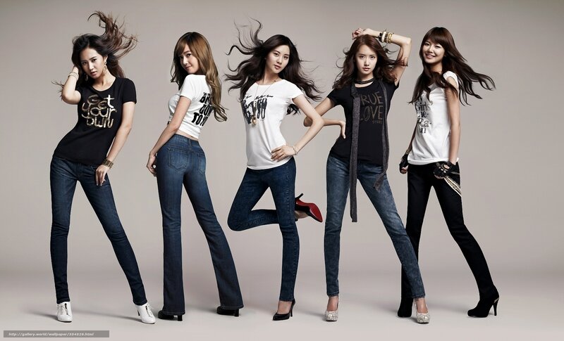 five women in jeans posing