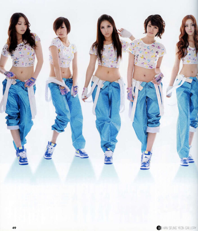 Five Women in Matching Outfits — White, Confident, Photograph, Blue Pants