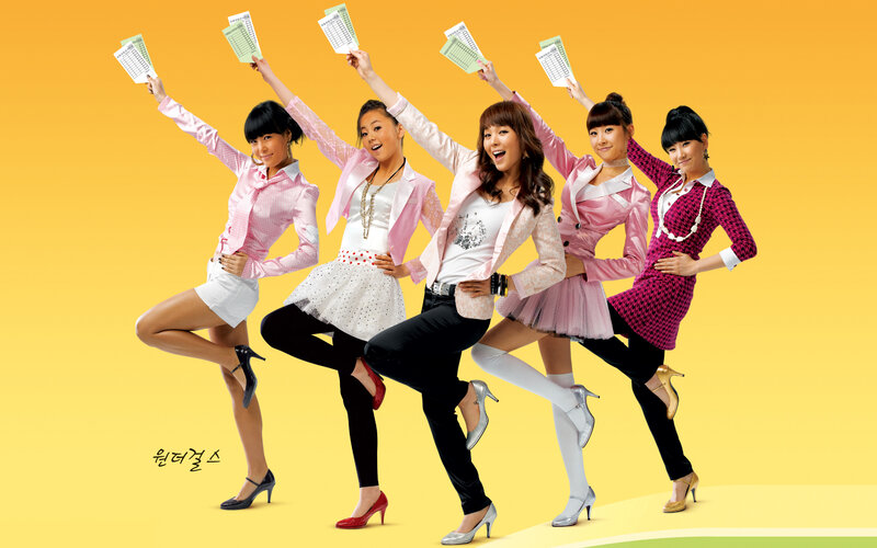 five women in pink outfits