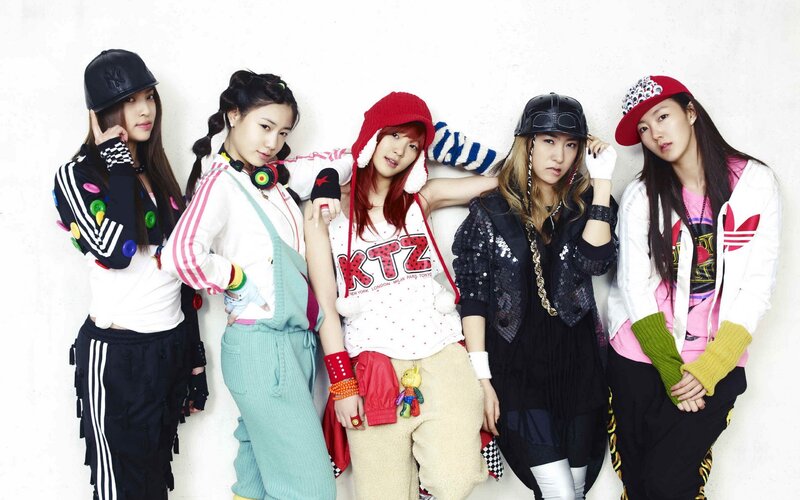 five women in stylish outfits