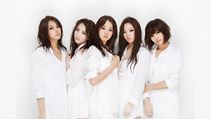 five women in white shirts